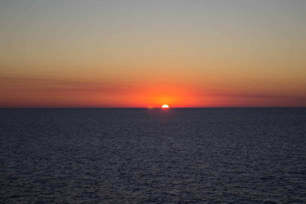 istock sunset over the calm sea on a beautiful day 1441588890