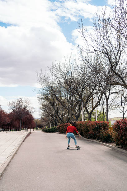 istock Skater Girl Practicing in the Park 1441590341