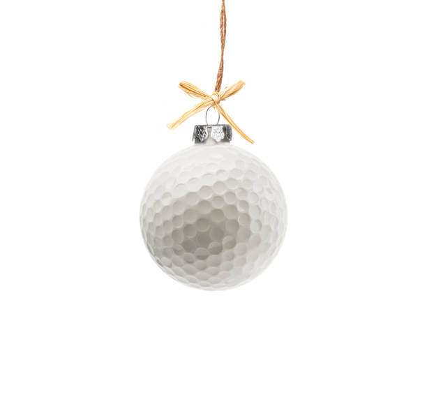 Golf ball as christmas ball isolated on white background stock photo