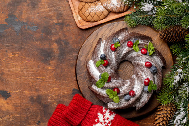 istock Christmas cake with blueberries, cranberries and mint 1441597858
