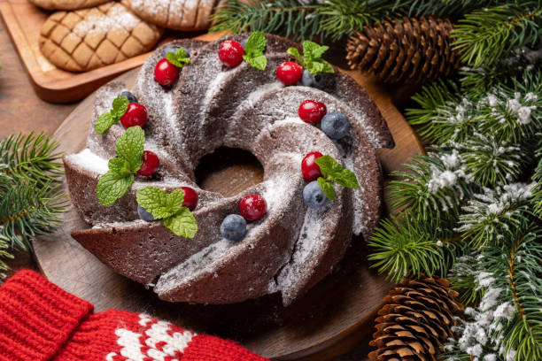 istock Christmas cake with blueberries, cranberries and mint 1441597937