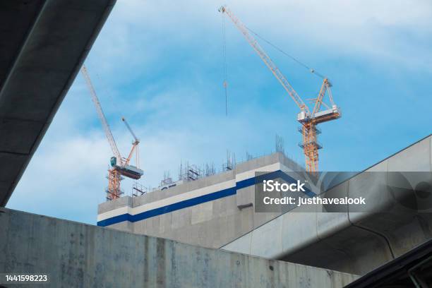 Detail Of New Bts Skytrain Line On Phahonyothin Rd And Construction Cranes In Bangkok Stock Photo - Download Image Now