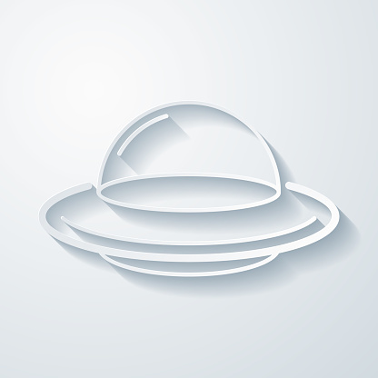 istock UFO - Flying saucer. Icon with paper cut effect on blank background 1441599948