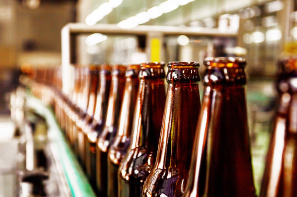 istock Beer bottle in conveyor belt 1441605719