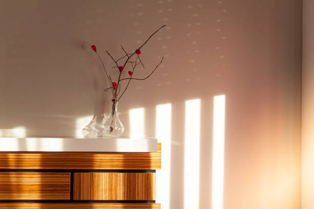 Bedroom with zebrano wood headboard stock photo