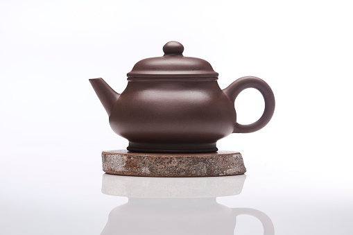 Ceramic teapot. Isolated white background.