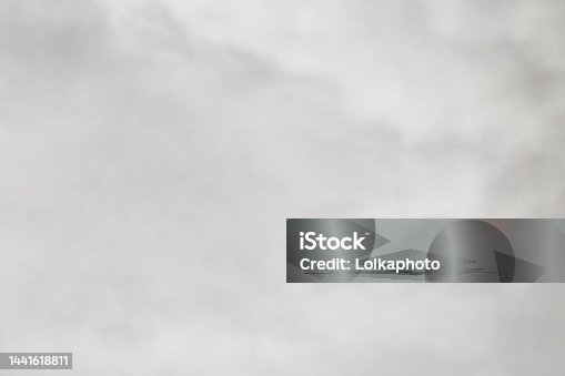 istock white transparent smoke on a gray background. smokey background. banner 1441618811