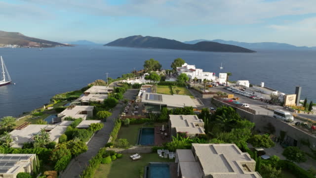 aerial view of luxury villas with same type of pool, luxury estate homes, luxury villas of a hotel, same villas, luxury lifestyle, villas by the sea