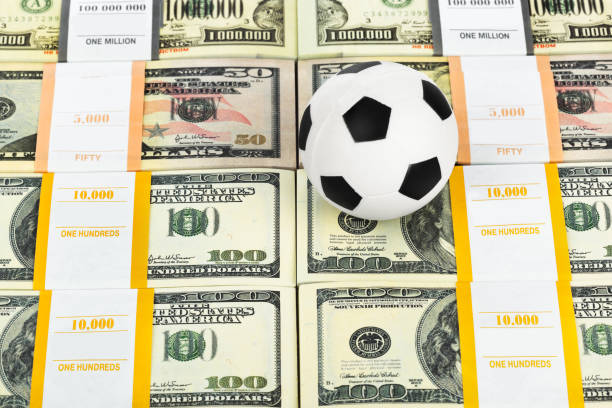 istock Money and soccer ball 1441619472