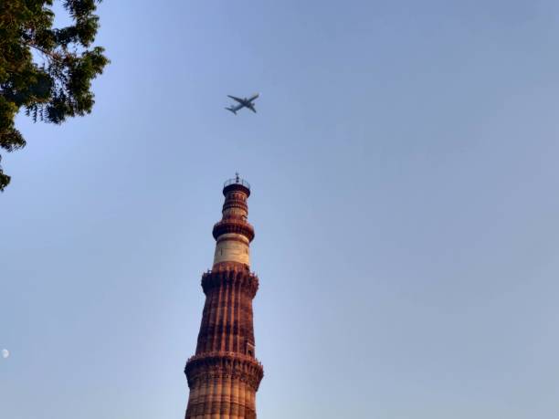 istock Aeroplane fly over Qutab Minar 1441620798