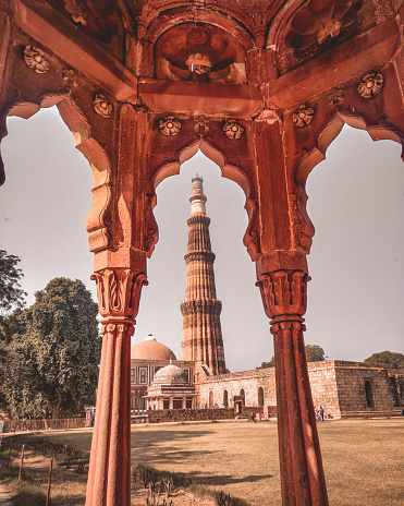 Qutub Minar is a minaret or a victory tower located in Qutub complex, a UNESCO World Heritage Site in Delhi's Mehrauli area. With the height of 72.5 metres (238 ft), Qutub Minar is the second tallest monument of Delhi. Its construction was started in 1192 by Qutb Ud-Din-Aibak, founder of Delhi Sultanate after he defeated the last Hindu Ruler of Delhi. He constructed the basement, after which the construction was taken over by his son-in-law and successor Iltutmish who constructed three additional stories. The fourth and fifth storeys were built by Firoz Shah Tuglak.