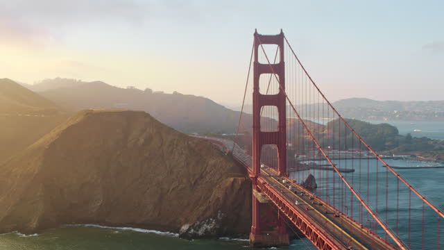 AERIAL Golden Gate Bridge, San Francisco, CA at sunset