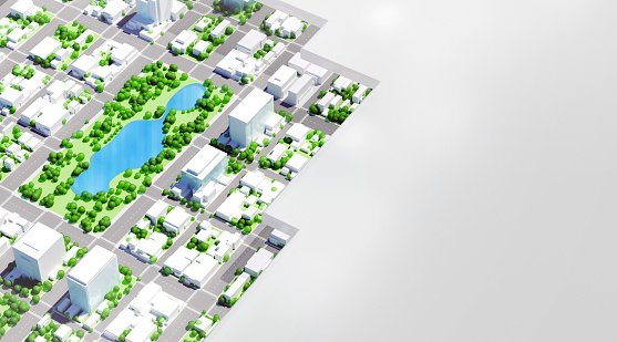 3D architectural model of city downtown district with green areas, urban parks, water resources and lakes. Urban planning and zoning with sustainable resources viewed through a template mask that allows plenty of copy space.