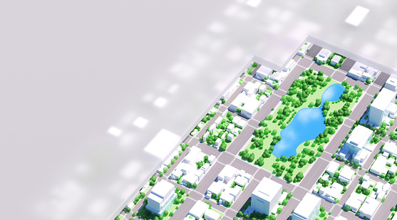 3D architectural model of city downtown district with green areas, urban parks, water resources and lakes. Urban planning and zoning with sustainable resources viewed through a template mask that allows plenty of copy space.