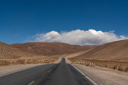 Empty road in the Andes mountain range desert, on the way to Salta, Argentina.