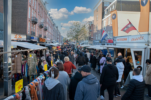 London, England - September 3, 2015: Crowds of people in Gerrard Street, in Soho, Central London. Soho is an area of contrasts - home to many Chinese people and businesses, film and music industries, Theatreland, the sex industry and a lively nightlife, as well as being a residential district.