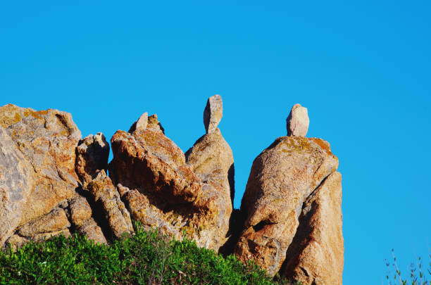 Characteristic rock formations at Capo Comino, Sardinia, Italy