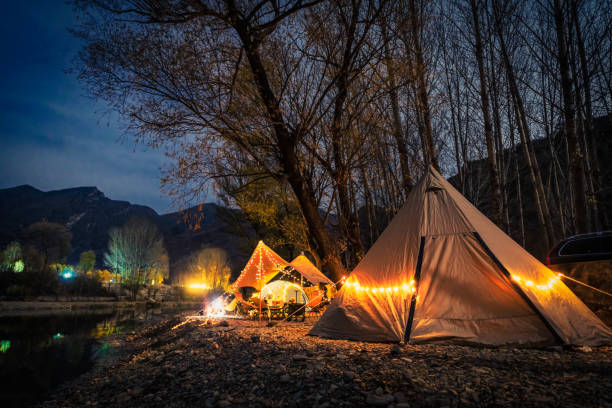Camping in the starry sky by the river in autumn