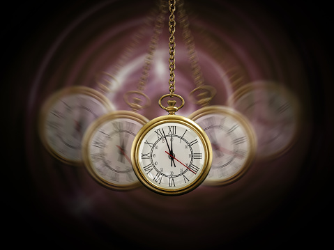 Gold pocket watch and chain, isolated on the white background, clipping path included.