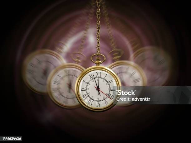 Gold Pocket Watch Swinging Hypnotically From Chain Black Background Hypnotism Concept Stock Photo - Download Image Now