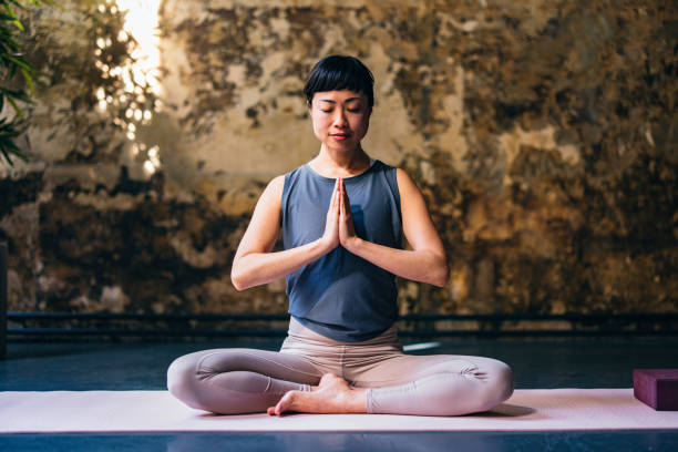 istock Beautiful Woman Practicing Yoga 1441634622