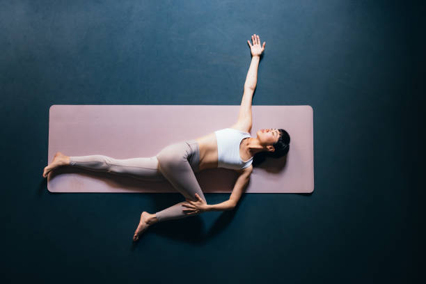 istock High Angle View Of Beautiful Woman Doing Warm Up Exercise 1441634683