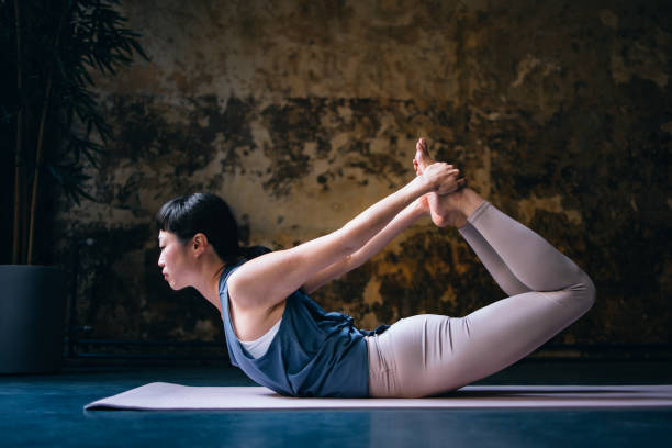 istock Beautiful Woman Practicing Yoga 1441634882