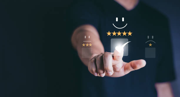 istock Customer service and Satisfaction concept, Business people touching the virtual screen on the happy Smiley face icon to give satisfaction in service. rating very impressed. 1441641714