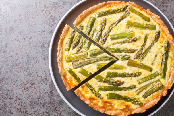 istock Spring creamy asparagus tart close-up in a plate. Horizontal top view 1441642780