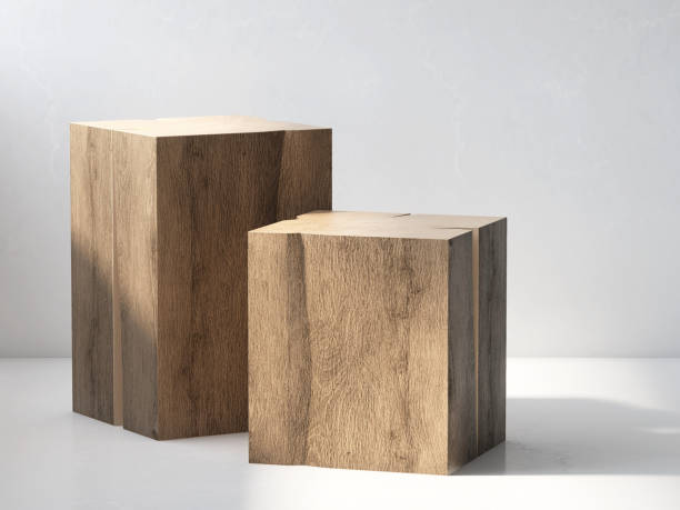 due moderni design a blocchi del podio del tavolo del piedistallo quadrato in legno con la luce del sole sulla parete e sul bancone di cemento bianco - side table foto e immagini stock