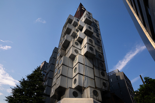 August 9, 2019: Nakagin Capsule Tower Building was a mixed-use residential and office tower designed by architect Kisho Kurokawa and located in Shimbashi, Tokyo, Japan. \nThe building is a rare remaining example of Japanese Metabolism\nThe demolition of the tower began on April 12, 2022.