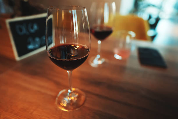 istock Glass of red wine is on the table. Wine degustation. 1441659246