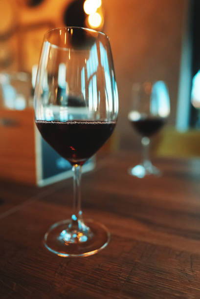 istock Glass of red wine is on the table. Wine degustation. 1441659252