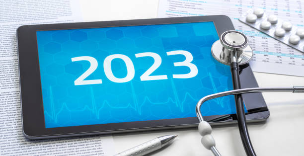 A tablet with the number 2023 on the display  A tablet with the number 2023 on the display stock photo