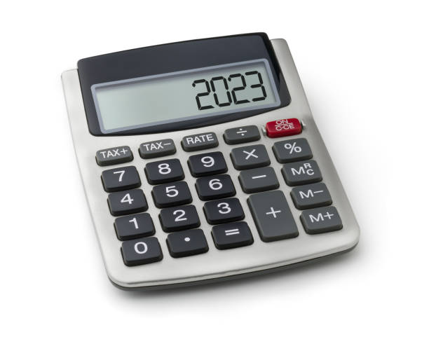 Calculator with the word 2023 on the display stock photo