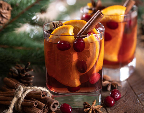 istock Mulled wine with orange slices, cranberries and spices 1441661298