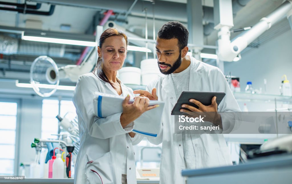 Scientists working in the laboratory Laboratory Stock Photo