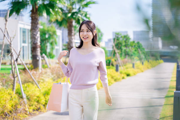 istock Young woman shopping at a mall 1441663687