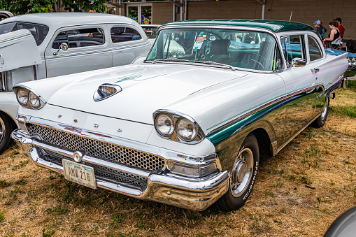 Des Moines, IA - July 02, 2022: High perspective front corner view of a 1958 Ford 2 Door Sedan at a local car show.