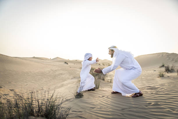 180+ Emirati People Walking Stock Photos, Pictures & Royalty-Free ...