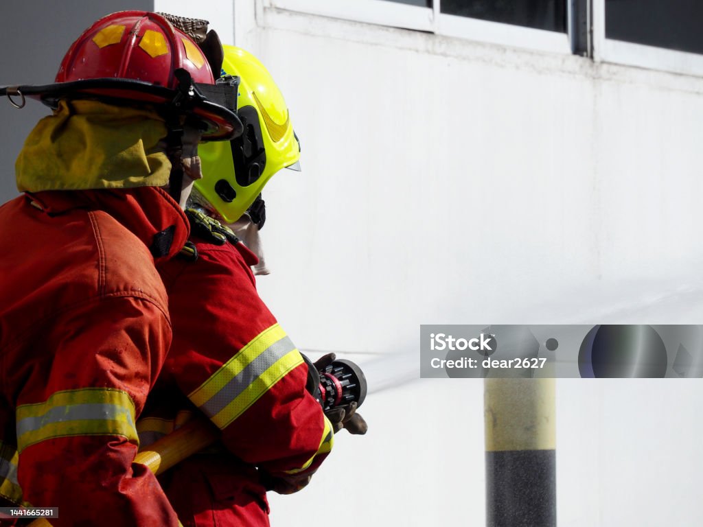 Fireman Trainee Firefighter Training Fireman Using Water And Extinguisher Stock Photo ...