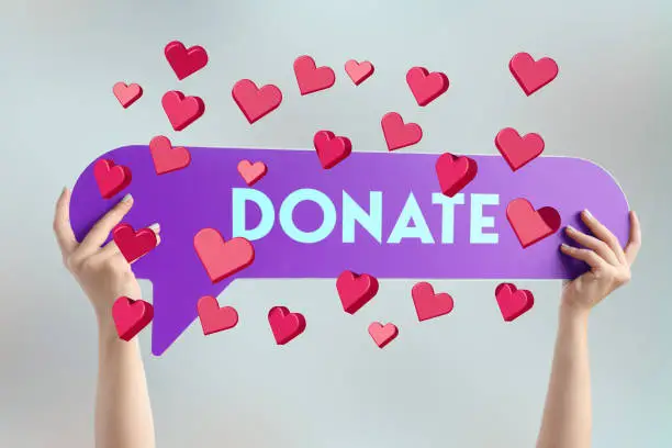 Photo of Woman showing Donate on speech bubble