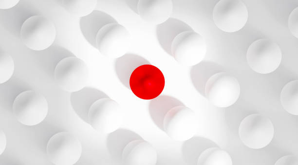 Leadership concept, high angle view a red color egg among white eggs