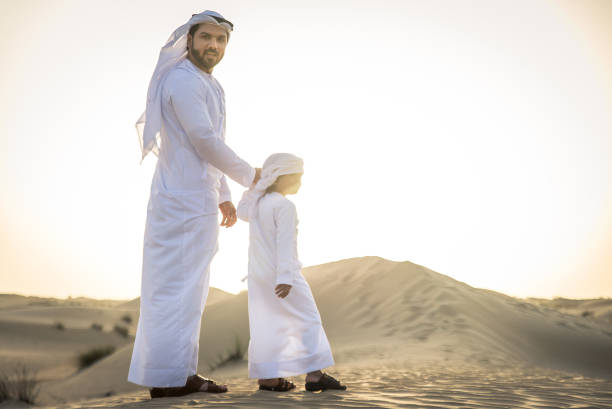 180+ Emirati People Walking Stock Photos, Pictures & Royalty-Free ...