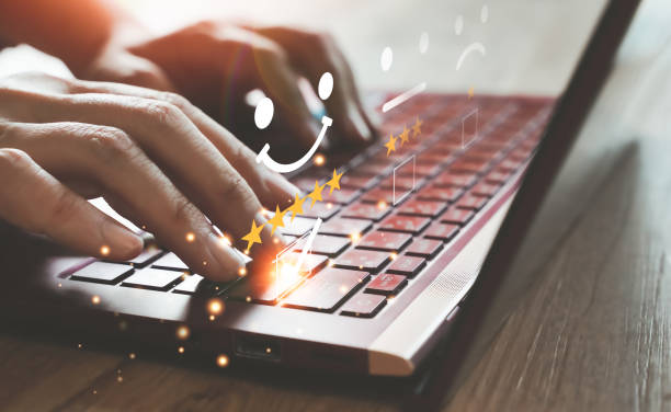 istock Businessman answering a questionnaire with a notebook, giving excellent satisfaction rating, five stars. Customer service satisfaction survey concept 1441669870