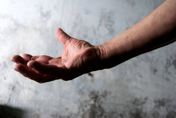 istock Older man's hands, anatomical detail, skin texture, expression and manual language, working man's hand. 1441673226