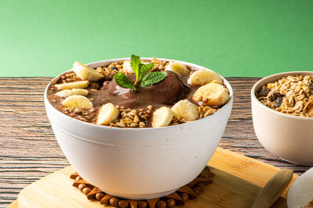 istock Acai cup. Brazilian famous fruit from Amazon, purple background. 1441674307