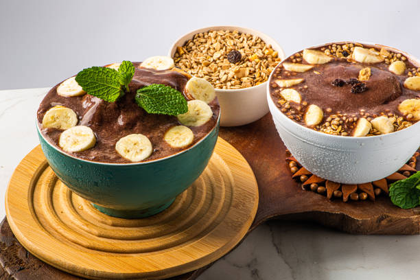 istock Acai cup. Brazilian famous fruit from Amazon, purple background. 1441674637