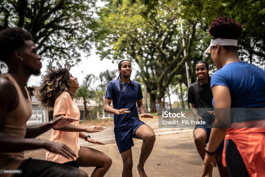 Student Image Square Teacher And Her Students Doing Exercise On A Square Stock Photo ...