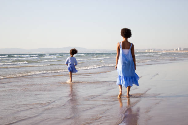istock Happy mother and daughter on vacation 1441679073
